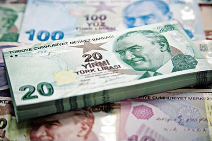 الليرة التركية تهبط إلى 21 مقابل الدولار