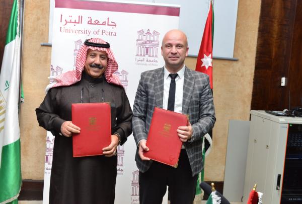 جامعة البترا توقع اتفاقية تعاون مع الاتحاد الأردني لرفع الأثقال