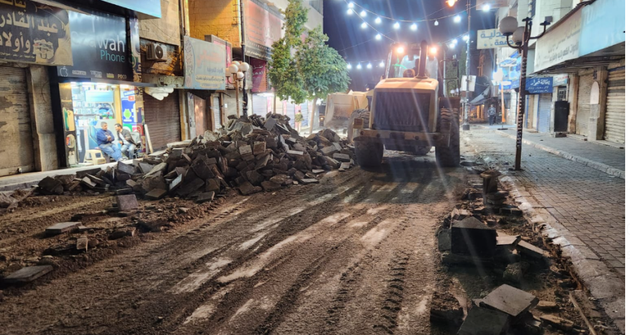 بلدية جرش الكبرى تزيل بلاط الوسط التجاري