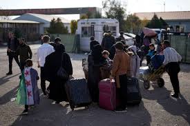 235 عائلة سورية تعود من الأردن إلى مدينة حمص في سوريا الجمعة