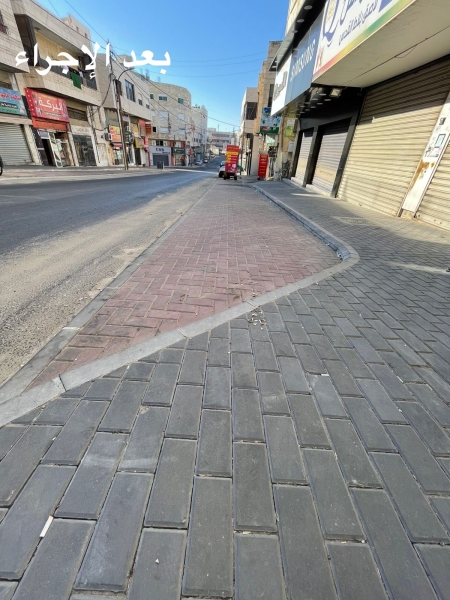 أمانة عمان تنفذ مبادرة لتأهيل الأرصفة في منطقة الجبيهة