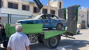 مواطنون يثمنون جهود أمانة عمان في تنظيف الشوارع من الحواجز والمركبات المهجورة